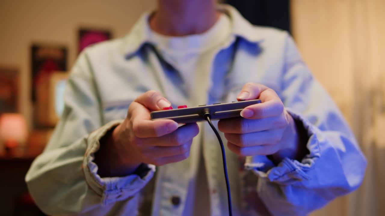 Person Playing a Retro Video Game