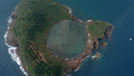 volcanic caldera aerial, now flooded on offshore islet, azores por