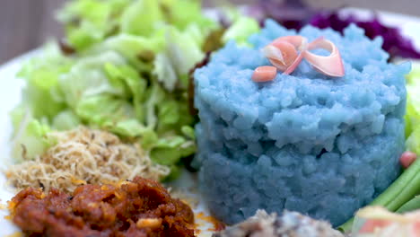 nasi kerabu or blue rice - traditional malaysian dish