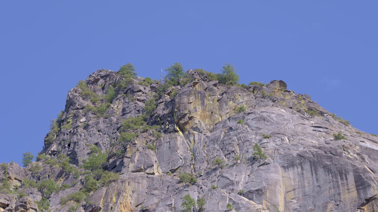 Detailed view of a granite rock formation in Yosemite National Park. Telephoto shot with slight zoom out