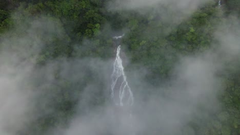 great waterfall in green dense forest, costa rica - 4k video