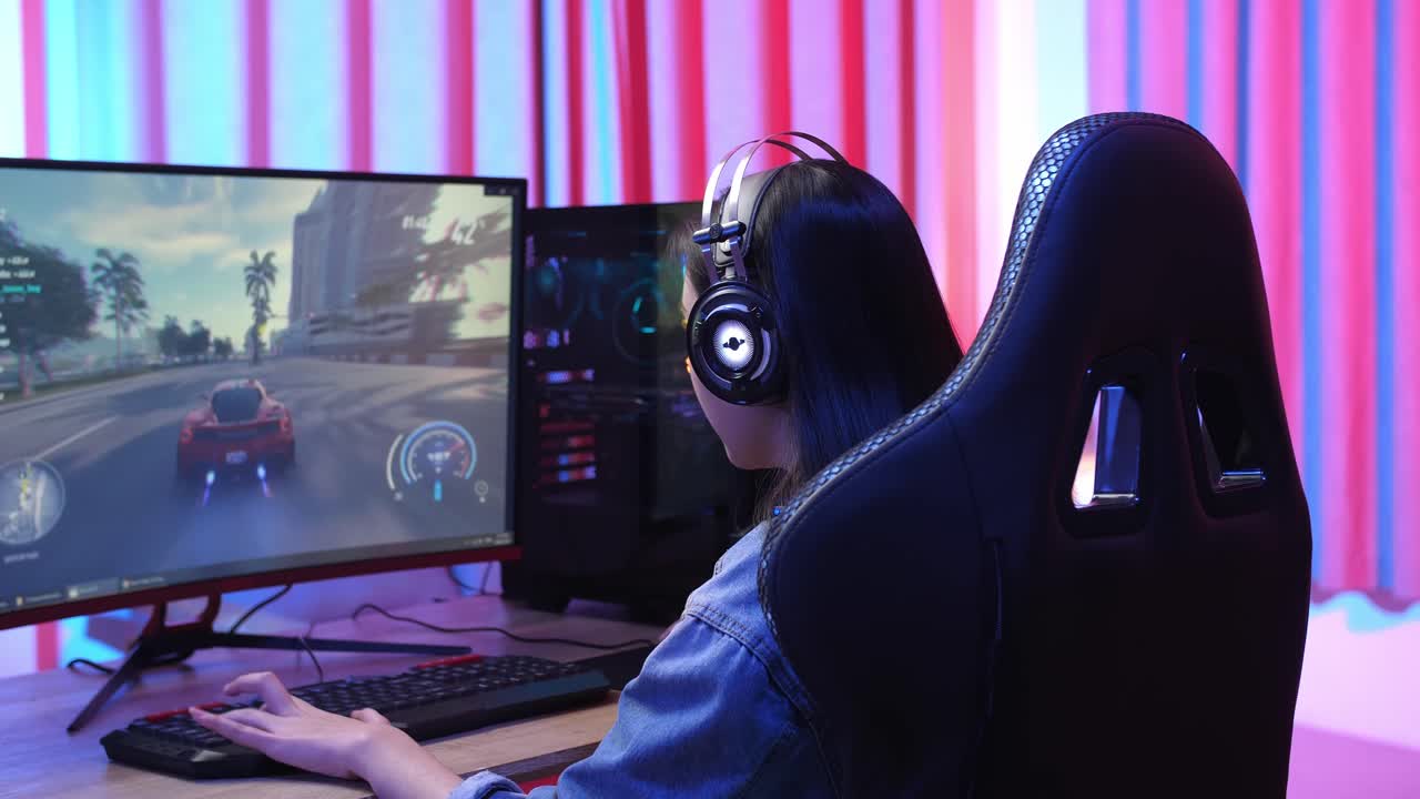 Excited Girl Playing Video Game On A Computer
