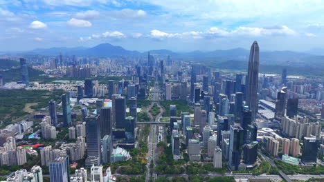 4k futuristic cityscape drone video - shenzhen's iconic ping an tower and exhibition hub in futian district