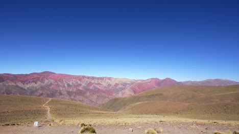 exploring fourteen colored mountain, near humahuaca, jujuy, argentina