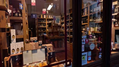 a cozy wine shop with various bottles displayed