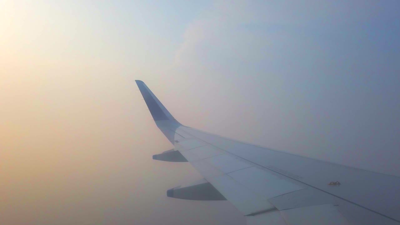 flight going in clouds closeup view in india