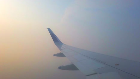 flight going in clouds closeup view in india