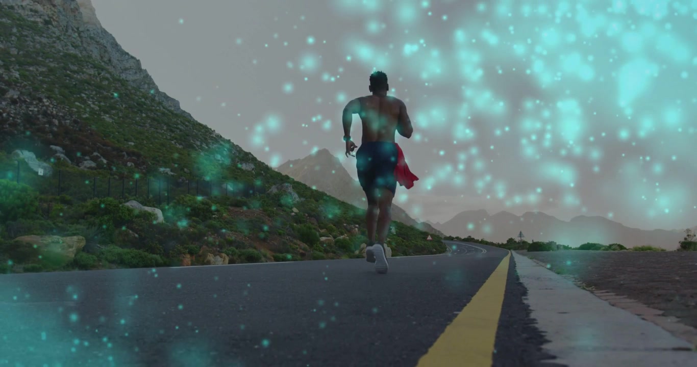 Vertical video: Shot start male runner running on road, turquoise overlay obscuring runner, fitness