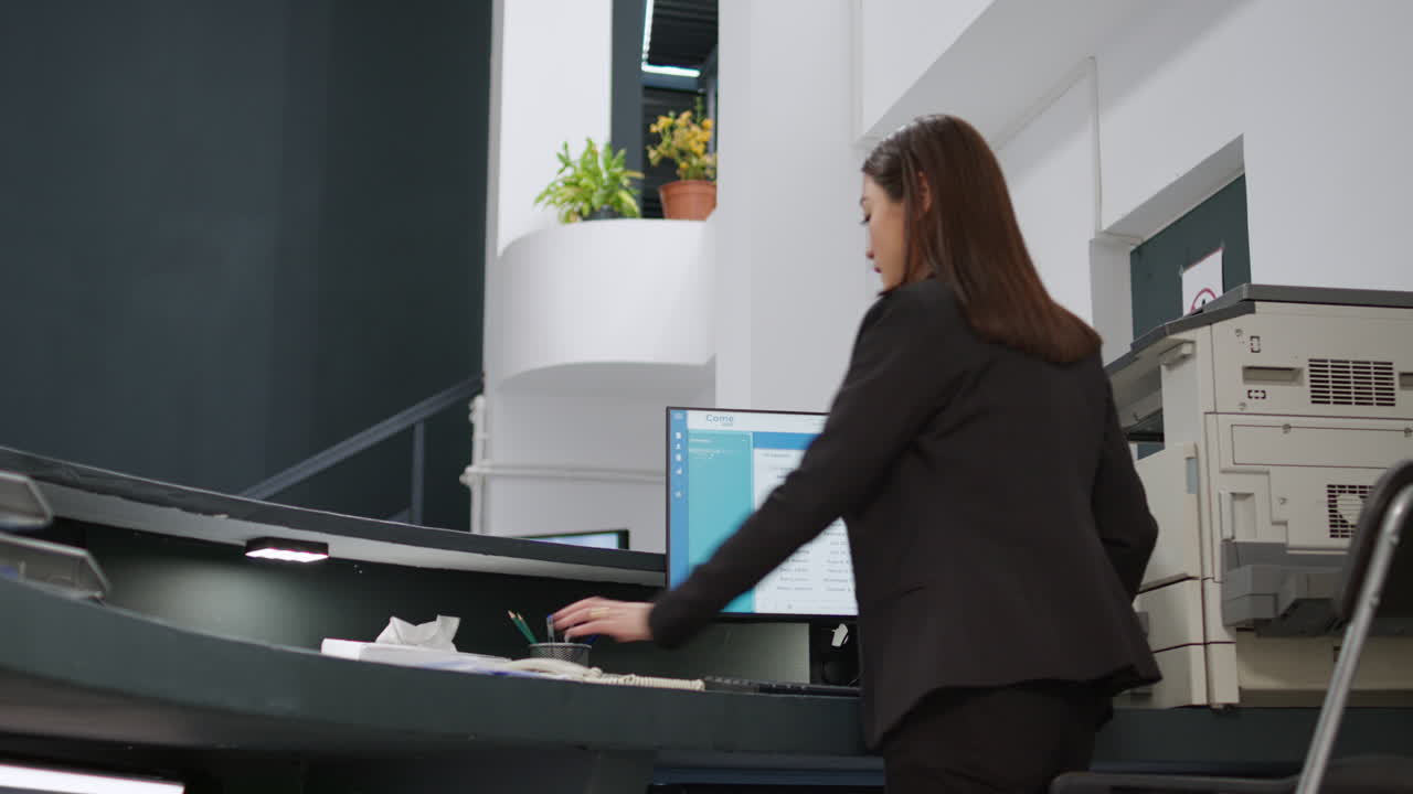 Reception Area with Elderly Patient and Receptionist