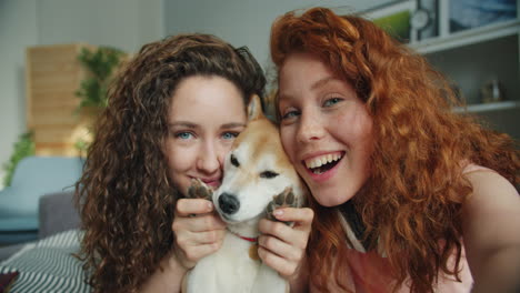 friends and dog taking a selfie