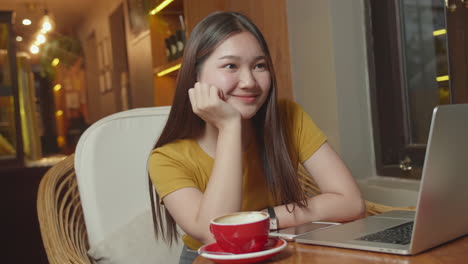 Beautiful Young Asian Woman Drink Coffee And Smiling To Man