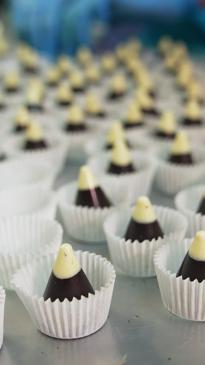 Candies making cloe up view. Tasty dessert sugar candies. Vertical video