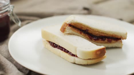 Close-up-of-peanut-butter-and-jelly-sandwich-in-a-plate