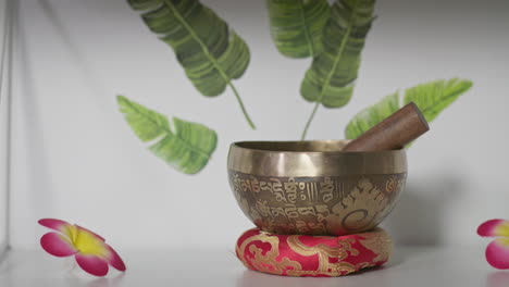 singing bowl sitting on a shelf at a massage studio