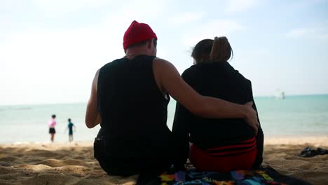 couple relaxing on the beach