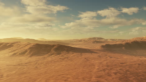 puesta de sol sobre las dunas de arena en el desierto