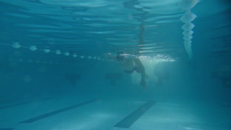 underwater swimming in a pool