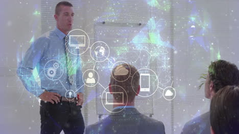 business presenter standing front of meeting room, projecting computer, cloud, smartphone icons