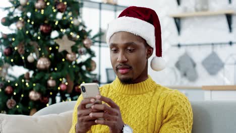 Close-Up-Of-Joyful-Surprised-Excited-Man-Receiving-Great-News-On-Smartphone-About-Lottery-Win-On-Christmas-Eve-Guy-Feeling-Happy-Having-Unbelievable-Luck-Happy-Emotions-New-Year-Sales