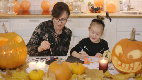 Mother-and-daughter-making-decorations