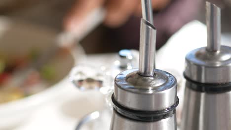 restaurant table setting with oil and vinegar