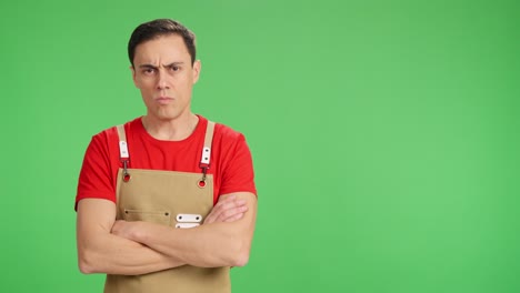 Self employed small business owner crossing arms with serious expression