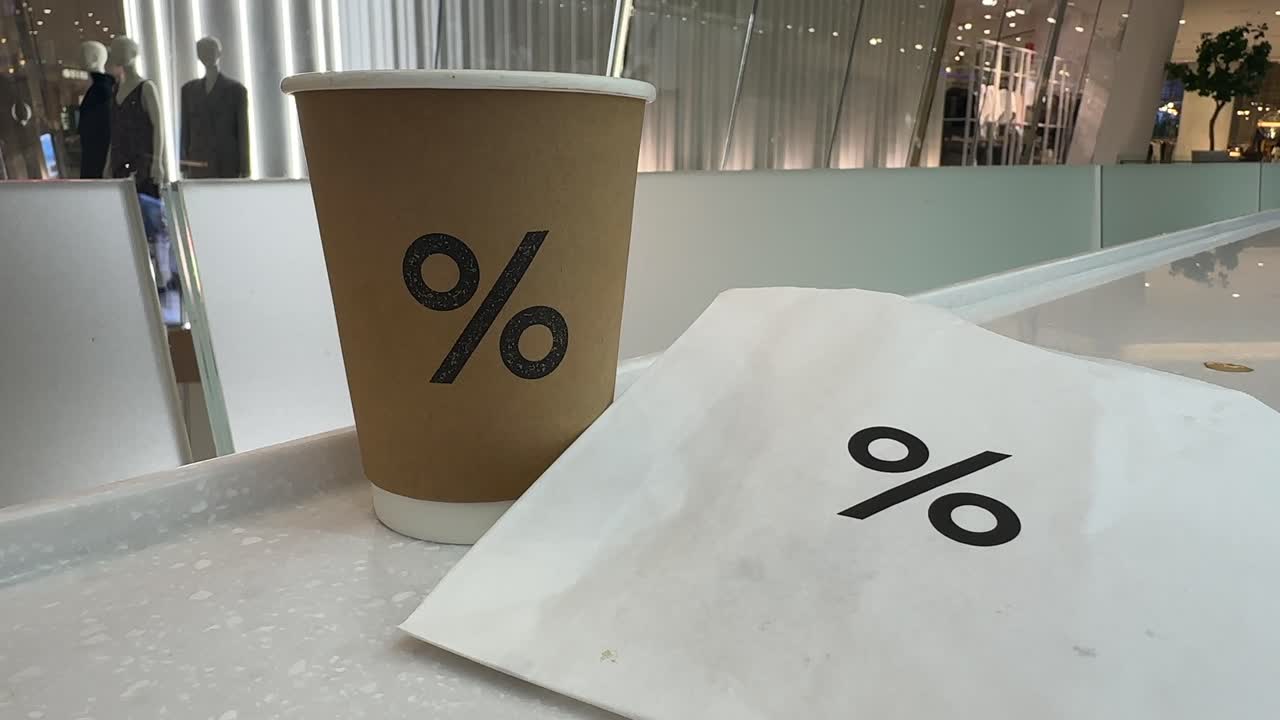 'Percentage' Sign Coffee Cup and Paper Bag - IconSiam Shopping Centre, Bangkok, Thailand