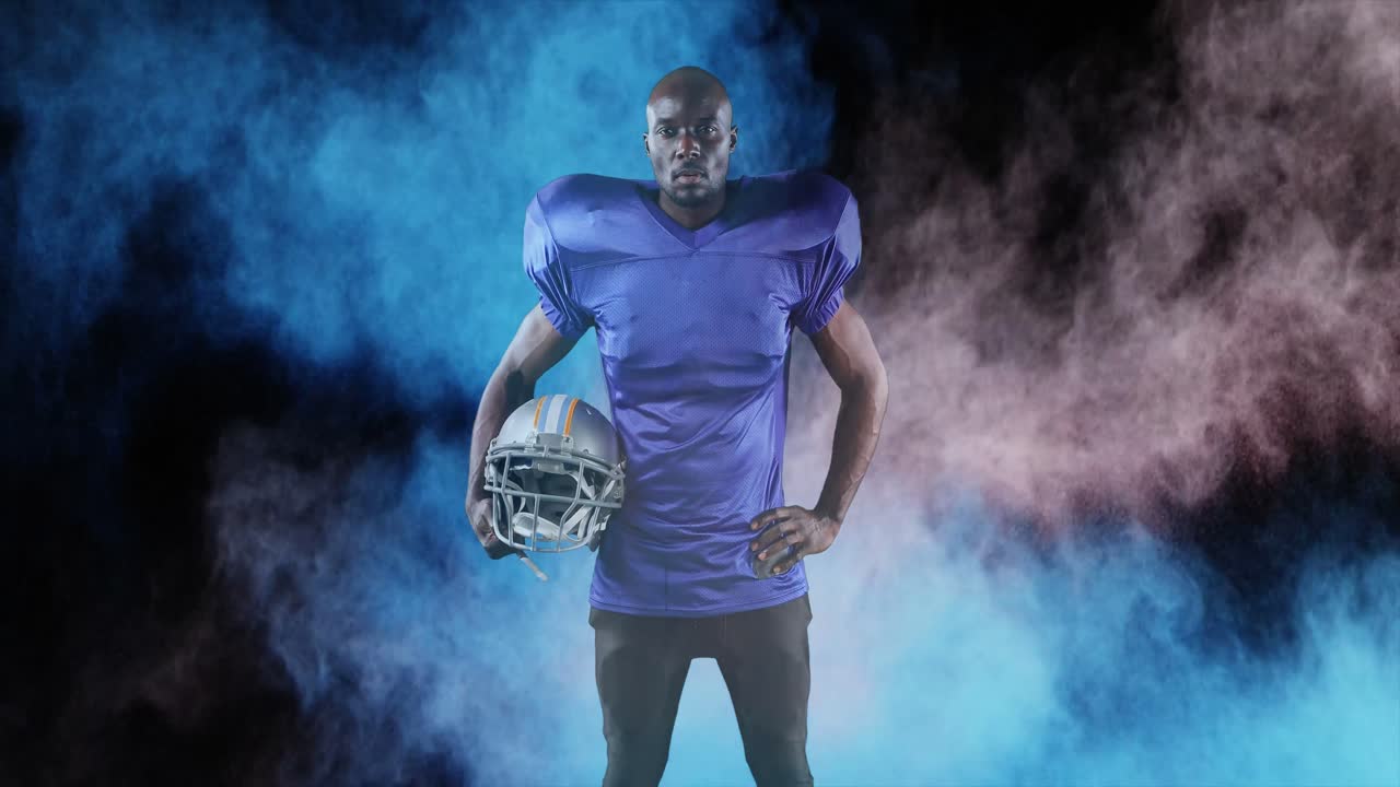Animazione di polveri colorate su giocatore di football americano