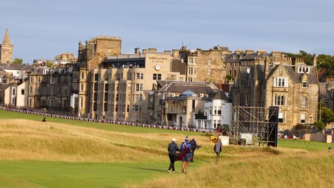 golfers walking on the famous st andrews course