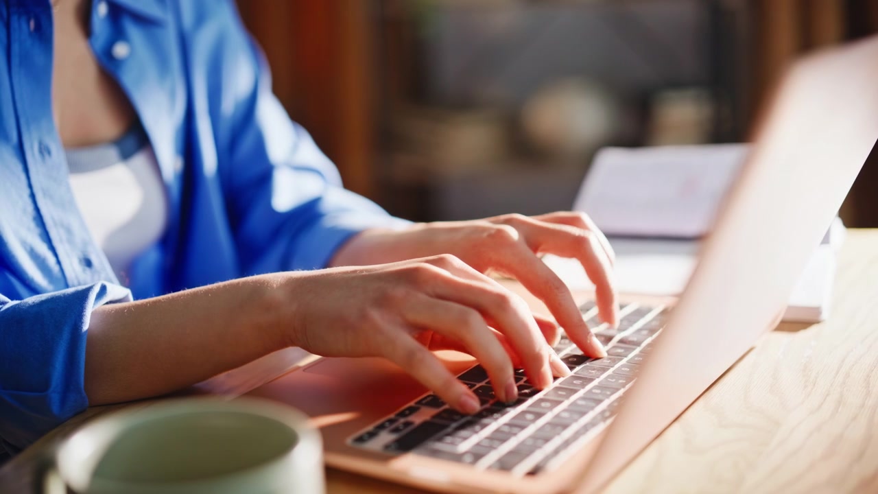 Close up woman hands typing laptop keyboard. Freelancer working remote office.