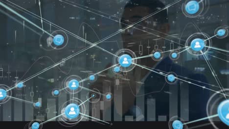 Animation-of-connected-icons,-graphs-over-time-lapse-of-vehicles-on-thoughtful-biracial-businessman