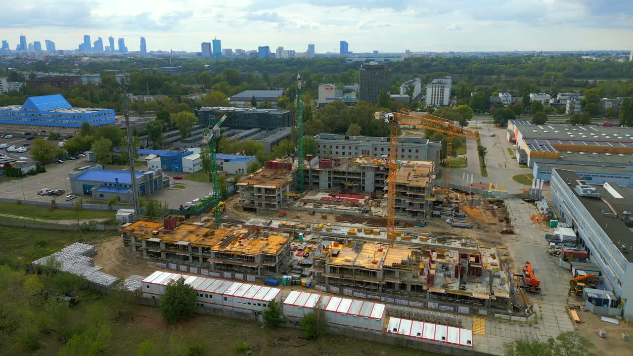 Construction site with cranes and buildings in Warsaw