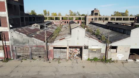 abandoned warehouse or factory building in detroit, aerial drone view