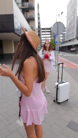 two women on city street