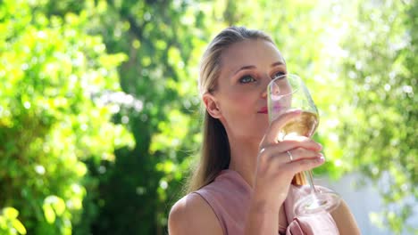 Woman-having-wine-at-restaurant