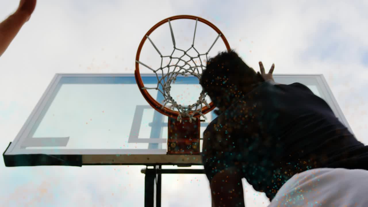As ball dropping dunker jumping twice and pushing ball through net during pickup court play