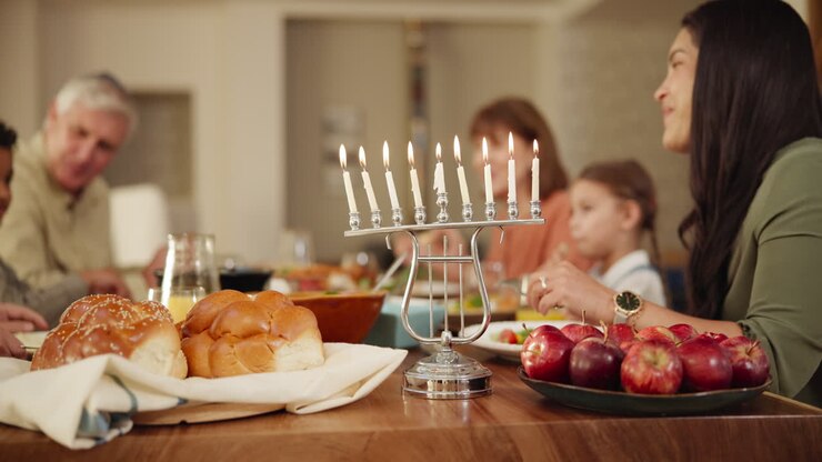 Home, hanukkah and menorah with family