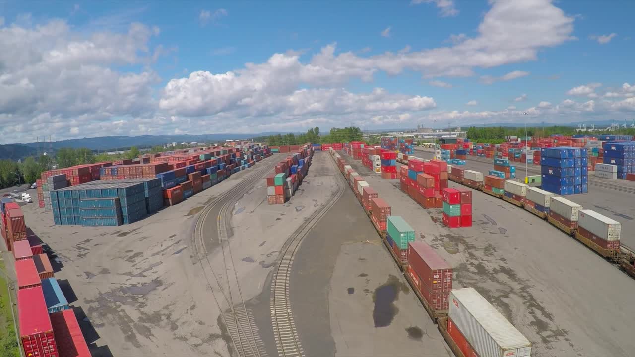 An aerial over a rail freight yard with containers in transit