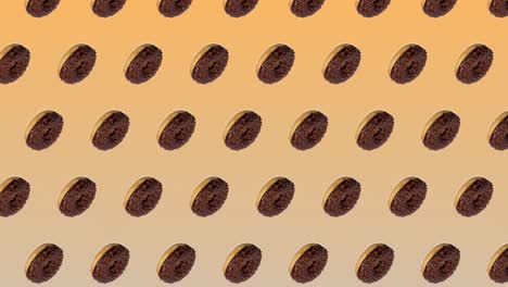 animación abstractamente colorida - rosquillas de vista lateral con chocolate y caramelo se mueven hacia arriba en círculo diagonalmente en fondo de gradiente amarillo - bucle sin costuras.