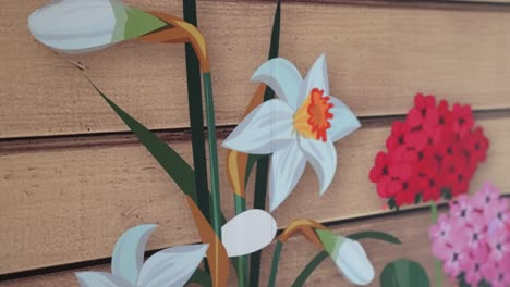 interior walls of a building have been decorated with vinyl sticker wall art to create a garden like environment in an old peoples care home with pictures of daisy flowers on the wall with fake wood