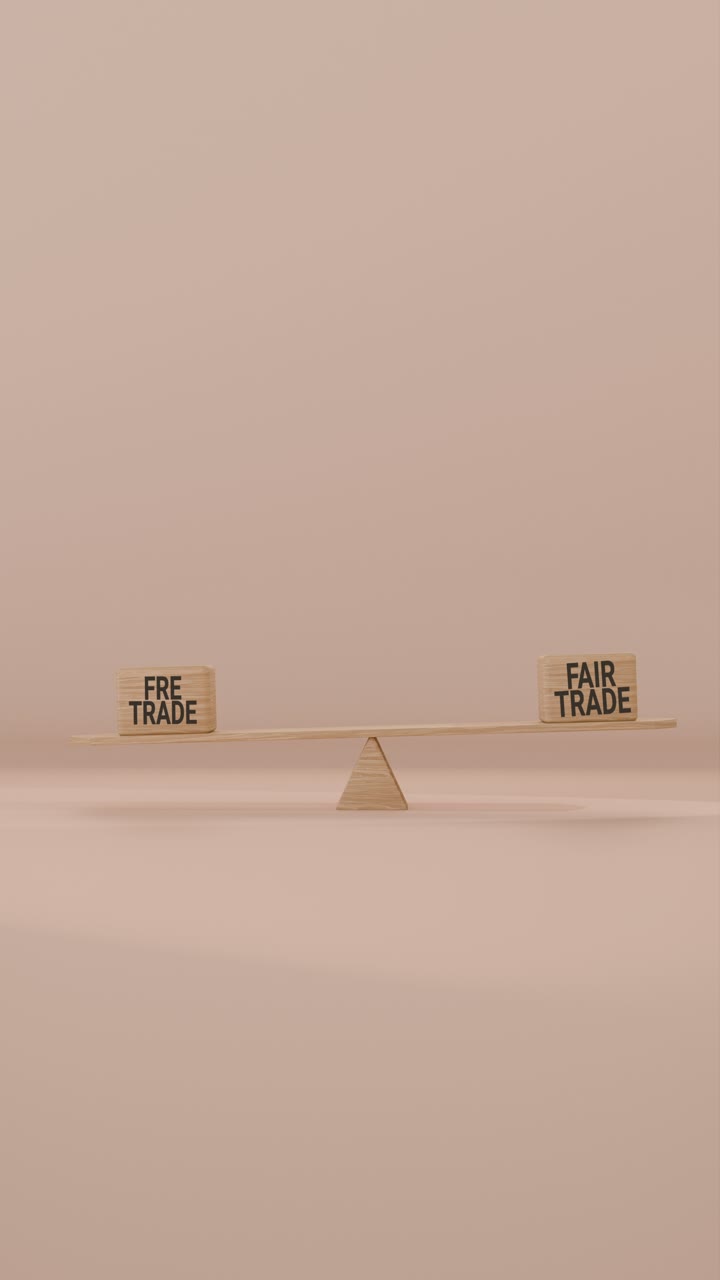 VERITCAL VIDEO OF FREE TRADE AND FAIR TRADE BALANCING ON SEESAW