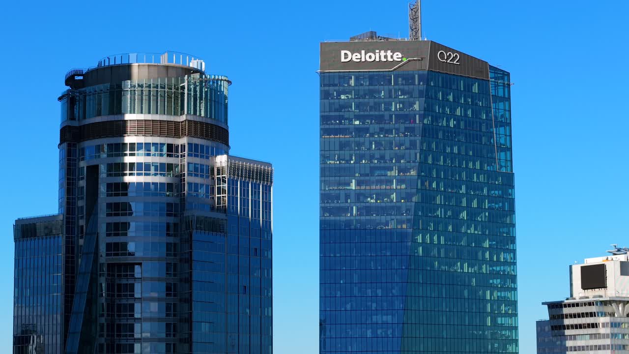 Deloitte city headquarters, Q22 building, glass facades, aerial view