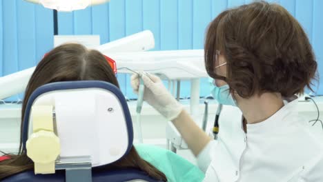 dentist examining patient