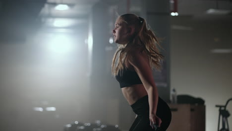 skipping woman training at the gym working out is healthy fitness body. young woman skipping rope. woman trains and jumping rope coordination training