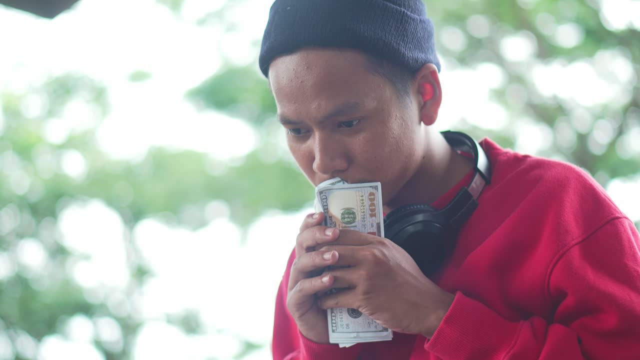 Happy Asian Man Freelancer Raise Hands With Money To Celebrating Succesful Project