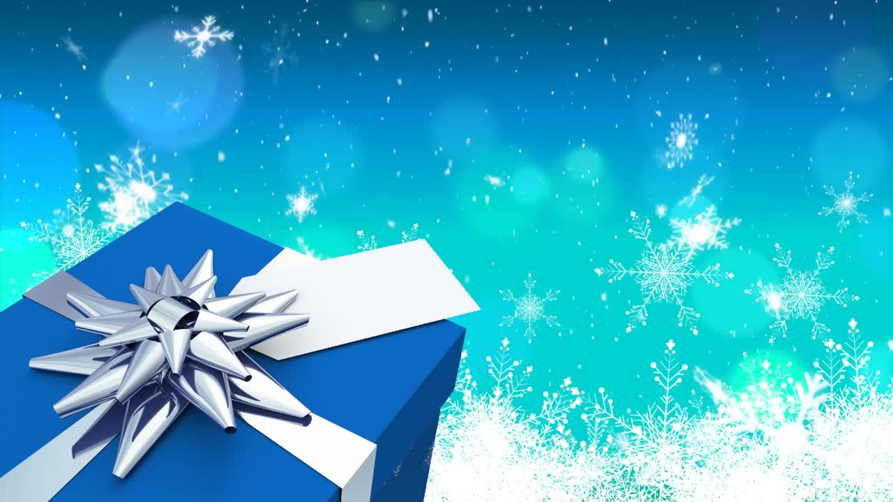 la nieve cayendo y el regalo de navidad