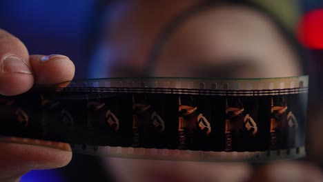 Hand Holding Film Strip