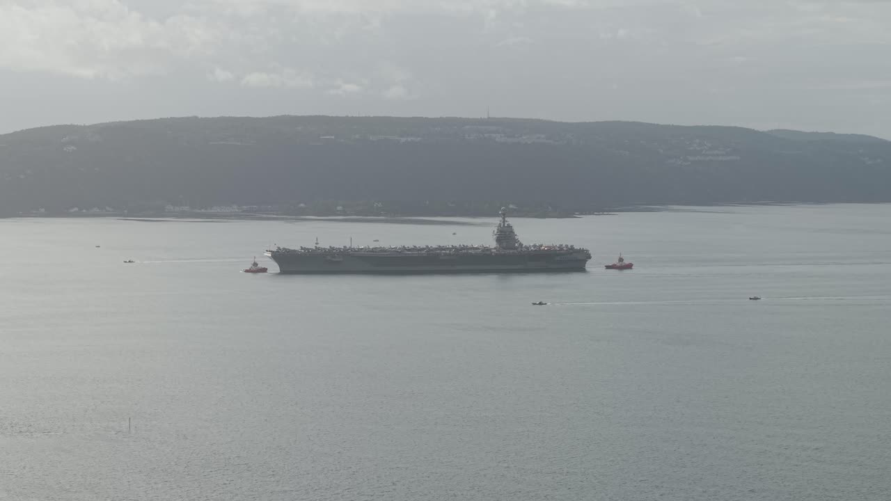 Aircraft Carrier USS Gerald R. Ford In Oslo Fjord, Oslo, Norway. - aerial shot