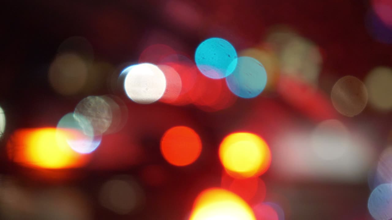 luces de bokeh coloridas en 4k movimiento lento 60 fps