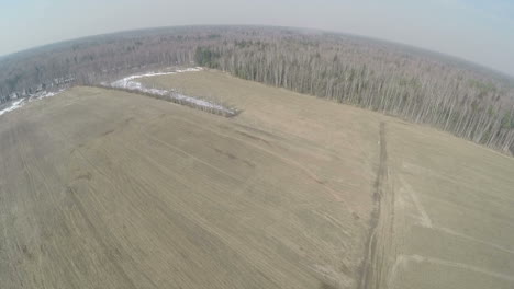 aerial shot of farmlands in early spring russia